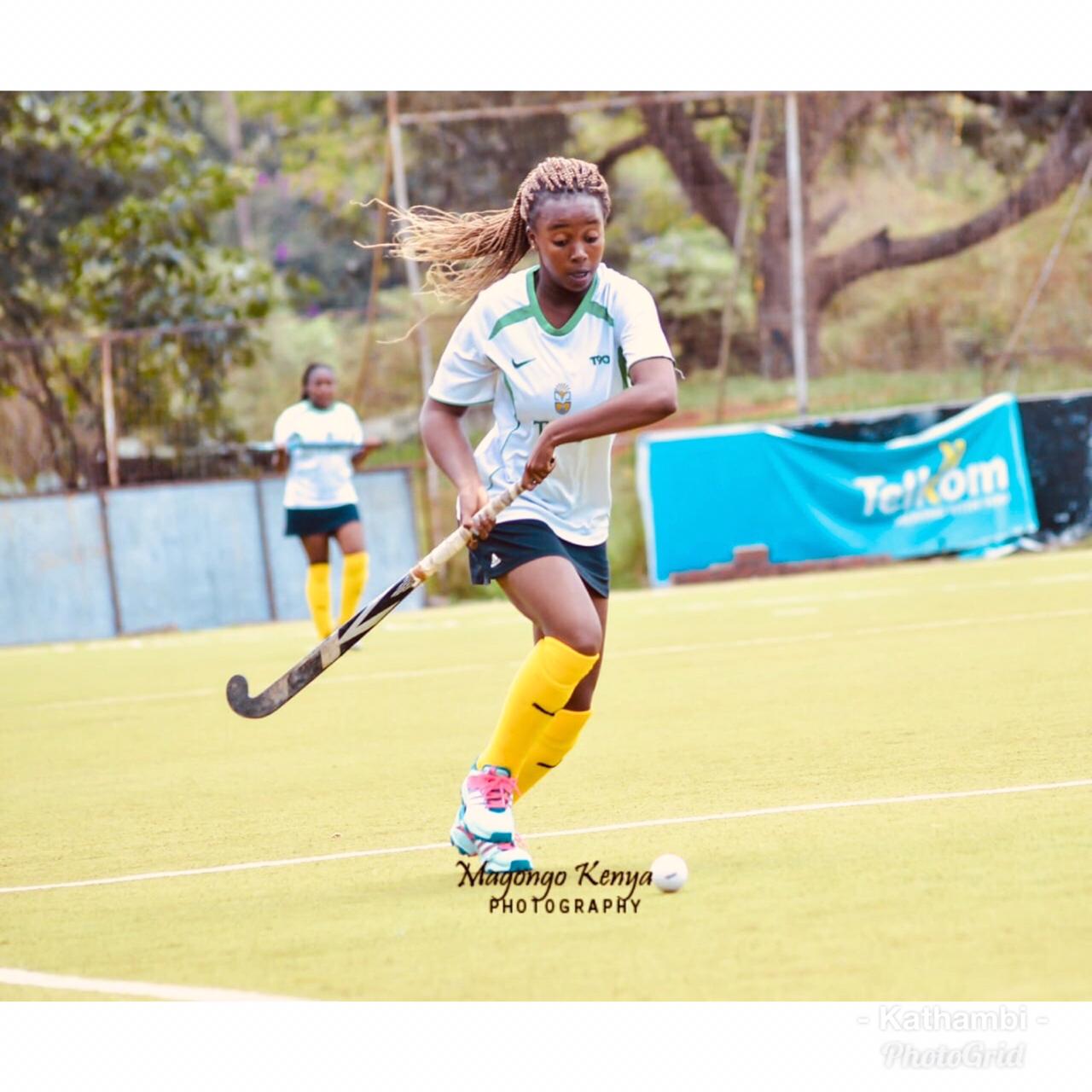 THE WOMAN BEHIND THE SPORT
